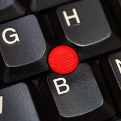 The TrackPoint on the keyboard of a ThinkPad